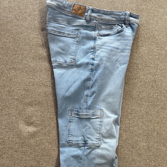 American Eagle Next Level Stretch Kick Boot Carpenter Pockets Light Wash Jeans - Picture 6 of 11